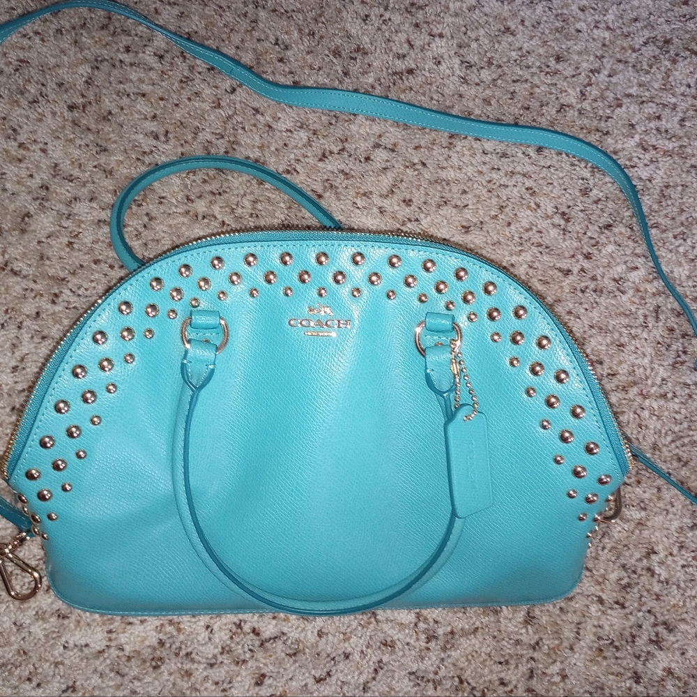 Coach turquoise purse with cross body strap